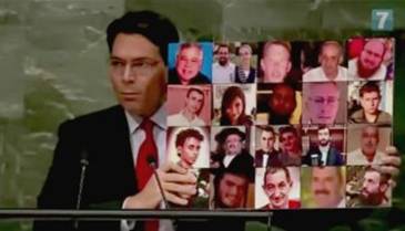 Danon presents photos of Israeli terror victims at UN | publicaffairs